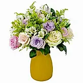 pastel passion floral design in a vase
